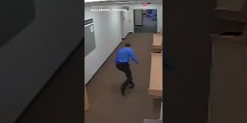 Person runs through empty hallway, Hillsboro, Oregon