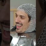 Person laughing in chainmail armor.