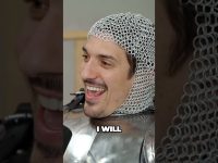 Person laughing in chainmail armor.