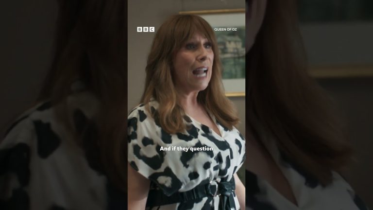 Woman speaking passionately in patterned dress.