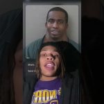 Person speaks with mugshot in background.