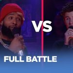Rap battle between two performers on stage