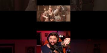 Gamer livestreams while playing action video game.