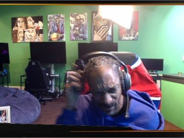 Person in gaming room with art in the background