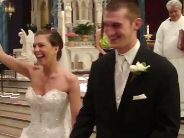 Joyful couple celebrating wedding in church