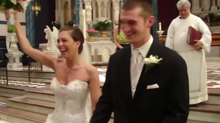 Joyful couple celebrating wedding in church