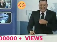 News anchor laughing during broadcast with 100,000 views.