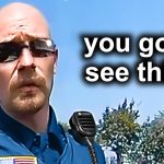 Police officer on phone, text reads 'you gotta see this'.