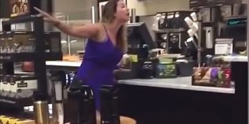 Woman gesturing in coffee shop