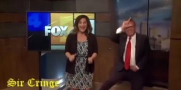 News anchors dancing in studio, humorous moment