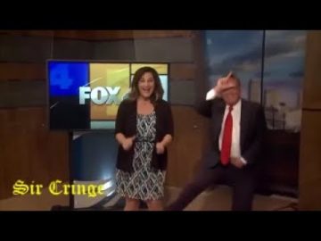 News anchors dancing in studio, humorous moment