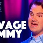 Comedian on stage with expressive face, Savage Jimmy