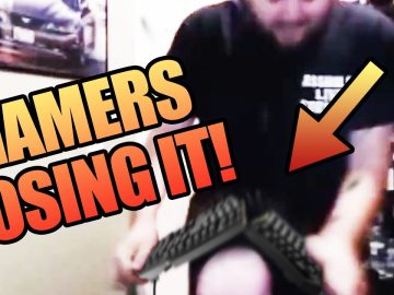 Gamer frustrated, breaks keyboard in rage.