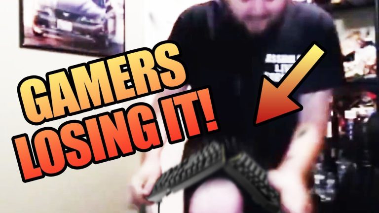 Gamer frustrated, breaks keyboard in rage.