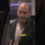 Man in leather jacket with 'DAWG' text