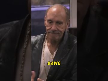 Man in leather jacket with 'DAWG' text