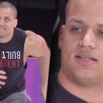Man wearing 'Built Different' shirt, focused expression.