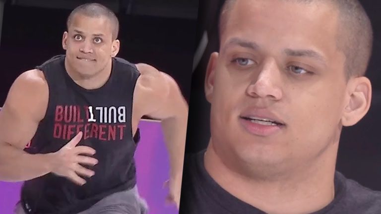 Man wearing 'Built Different' shirt, focused expression.