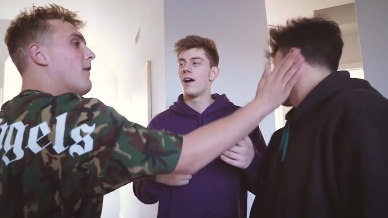 Three friends interacting playfully indoors