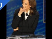 Person speaking at event, Washington Post logo visible.