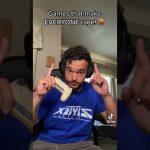 Gamer reacting angrily, holding a controller.