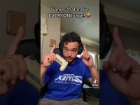 Gamer reacting angrily, holding a controller.
