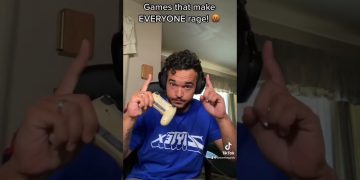 Gamer reacting angrily, holding a controller.