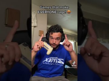 Gamer reacting angrily, holding a controller.