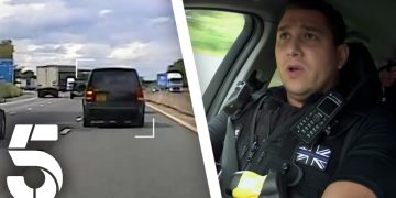Police chase on highway with officer in car.