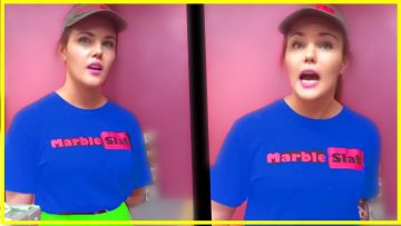 Person in Marble Slab uniform standing, pink background