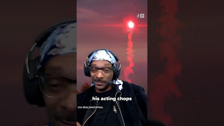 Person with headset in front of red smoke background.