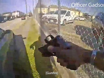 Body camera footage showing an officer shooting.