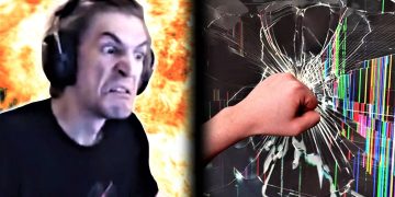 Angry gamer smashes screen with fist explosion background.