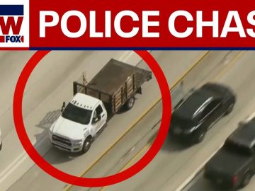 Live police chase involving white flatbed truck