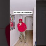 Person in red hoodie in hallway parody scene.
