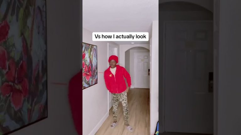 Person in red hoodie in hallway parody scene.