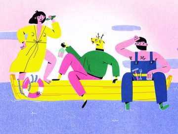 Three people enjoying drinks on a boat.
