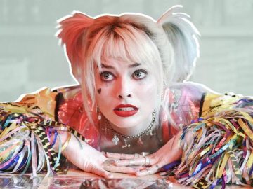 Colorful character with ponytails and vibrant sleeves