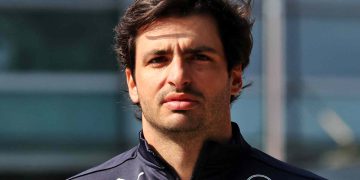 Person in Puma jacket with Gulf logo.